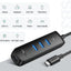 Configuration portable avec le Hub USB Ultra Mini d'UGREEN, illustrant sa facilité de transport et d'utilisation en déplacement